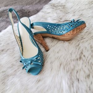 Akristina Laser-Cut Cork Heel Sandal
5M turquoise